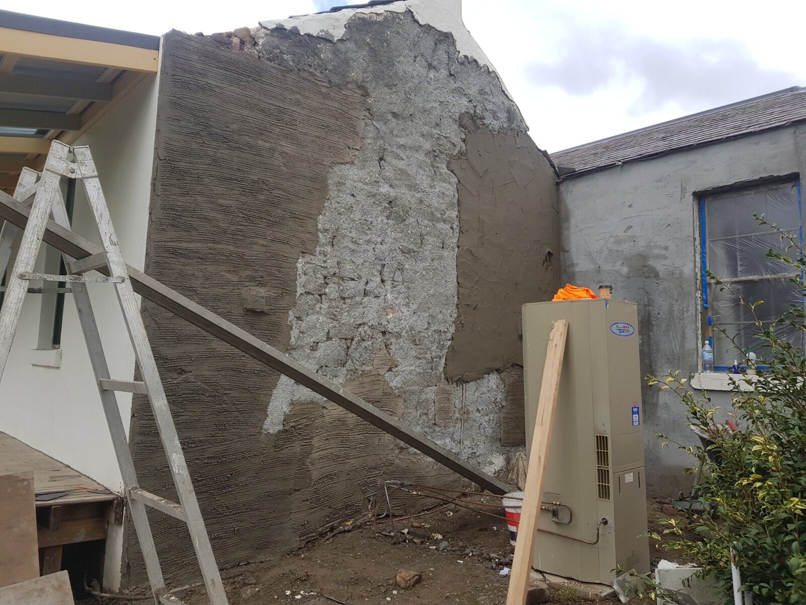 Render built out to a gable end at Rosehill Homestead