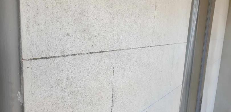 Recreated block joints being cut into restored render