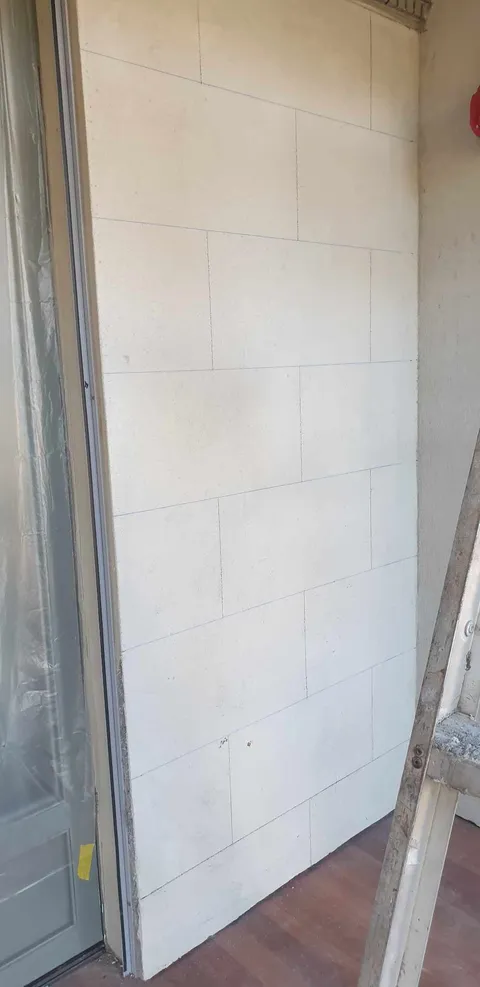 Original block pattern transferred onto newly rendered facade