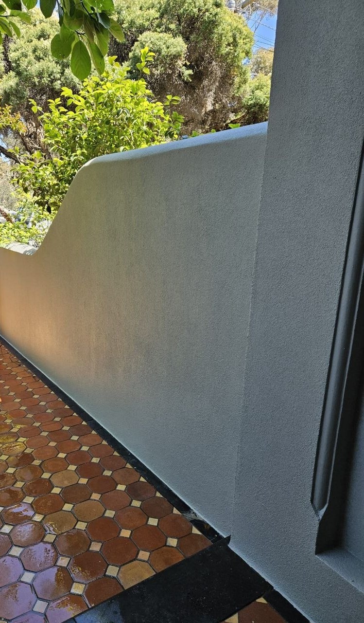 Completed rendered parting wall with textured acrylic finish at 753 Park Street Brunswick