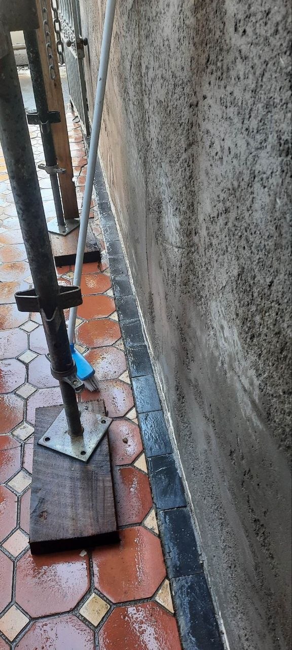 Sand and cement render build-out applied to the Brunswick parting wall