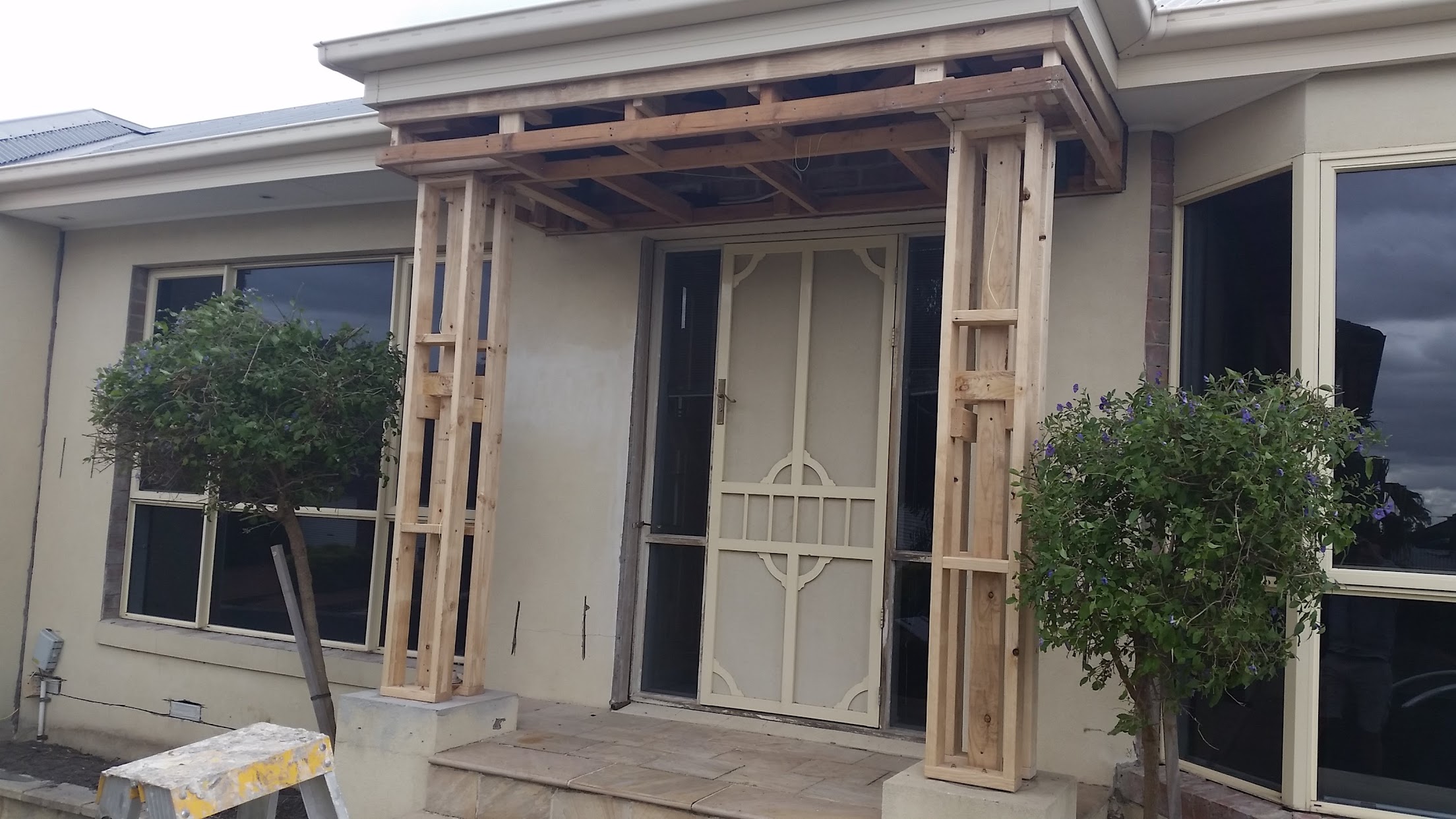 Front portico and façade prepared for remedial rendering in South Morang